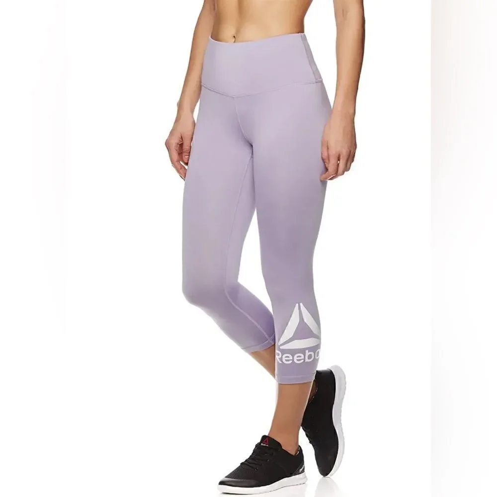 Stay Fit in Style: Reebok Women's Wanderlust Capri Compression Athletic Pants